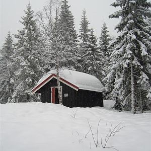 Het hout-hok in de sneeuw